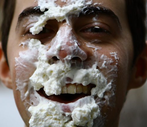 Andrew Belliveau, who has Gastoparamesis, is seeking to gain awareness and fund-raise for a cure, shown here with whip cream on his face, he has begun a "pie-in-the-face" challenge.
