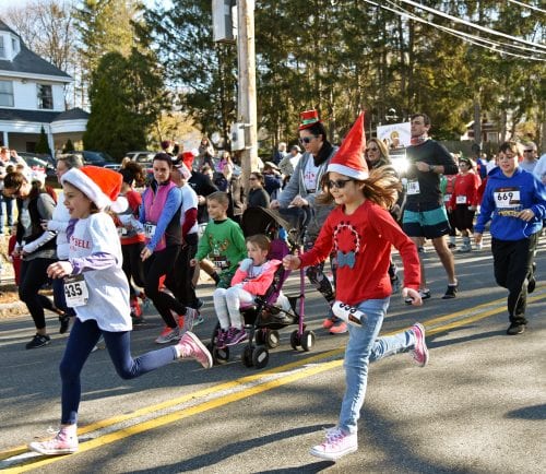 Hundreds of families and friends participated in the fifth annual Jingle Bell 5K Run/Walk on November 25 to raise money for Medford schools.