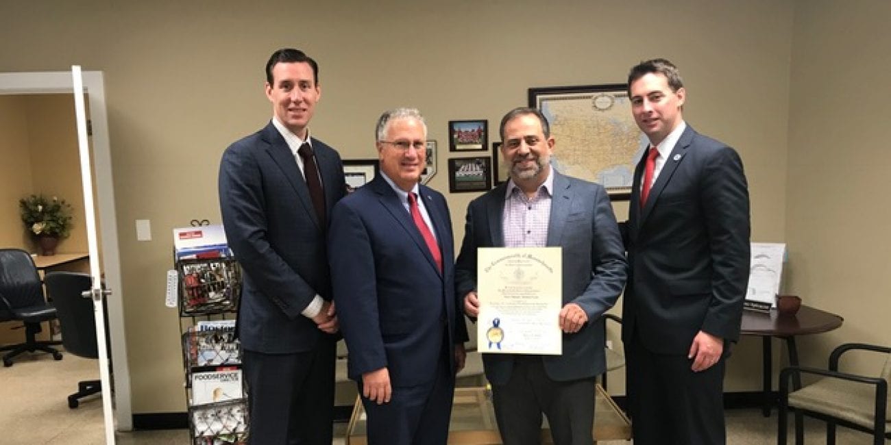 Sidekim Foods' Peter Mikedis (third from left) was recognized for his civic leadership from Mayor Thomas M. McGee (second from left), and state Rep.s. Brendan Crighton (right) and Dan Cahill. Mikedis received a citation during the Raising Our Voices event attended by the legislators.