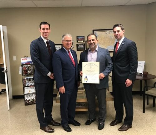 Sidekim Foods' Peter Mikedis (third from left) was recognized for his civic leadership from Mayor Thomas M. McGee (second from left), and state Rep.s. Brendan Crighton (right) and Dan Cahill. Mikedis received a citation during the Raising Our Voices event attended by the legislators.