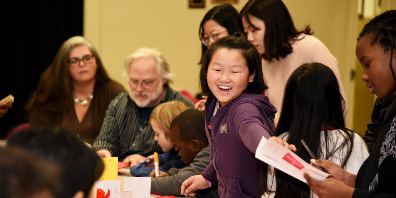 Catherine Xu having fun with friends during the February 15th Chinese New Year Celebration at the Medford Public Library.