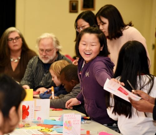 Catherine Xu having fun with friends during the February 15th Chinese New Year Celebration at the Medford Public Library.
