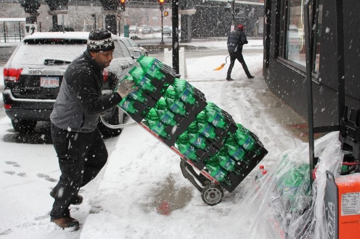 Lynn, Ma. 2-7-18. Manny Parrill delivers soda to Domino's Pizza on Union Street.