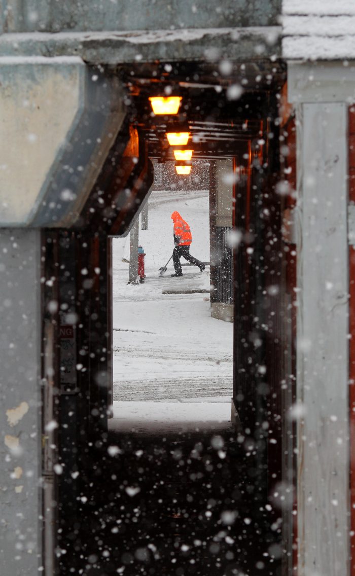 Lynn, Ma. 2-7-18. Tony DeLeon shovels the sidewalk on Silsbee Street in Lynn.