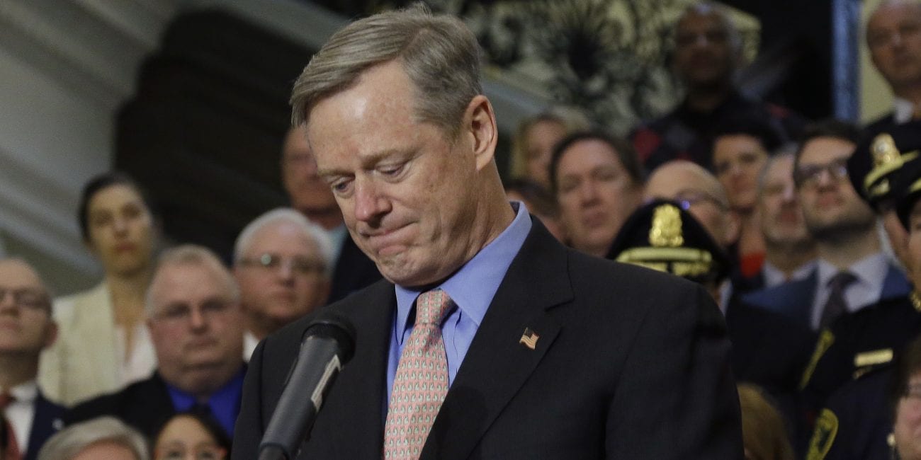 FILE - In this Monday, March 14, 2016 file photo, Gov. Charlie Baker becomes emotional as he speaks after signing sweeping legislation aimed at reversing a deadly opioid addiction crisis, at the Statehouse in Boston. A spokesman for Baker, a Republican who served on the Trump commission on opioids, said, “Governor Baker encourages members of Congress to work together on a plan forward to fully fund the bipartisan recommendations.” (AP Photo/Elise Amendola)