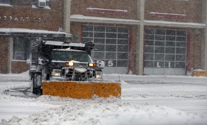Lynn, MA—Tue March 13, 2018—Plow truck clears snow in front of the Fayette Street Fire Station.