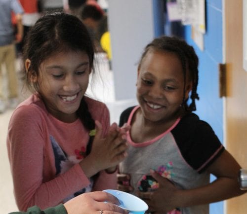 Lynn, Ma. 4-26-18. Aaliyah Grullard, left, and Kayla Corley, right with their science project Ancient Civilization water wheel at the science fair held at the Lynn YMCA.