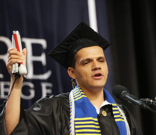 Francisco "Dany" Acosta speaks during the 2018 North Shore Community College commencement.