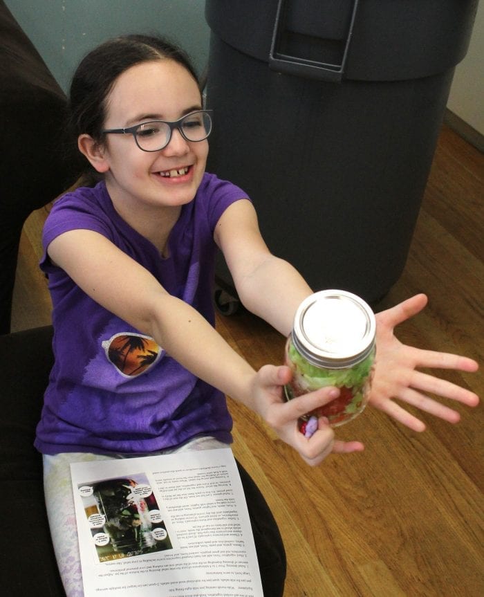 Lynn, Ma. 5-3-18. Jasmin Guzman with her completed Salad in a Jar, a project created at Girl's Inc.