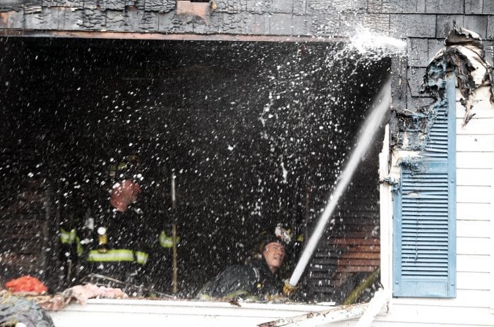 Lynn, MA--Fri May 4, 2018--Lynn firefighters battle a two-alarm fire at a two-family home at15 Dorinda Circle shortly before 9 a.m. Friday morning.