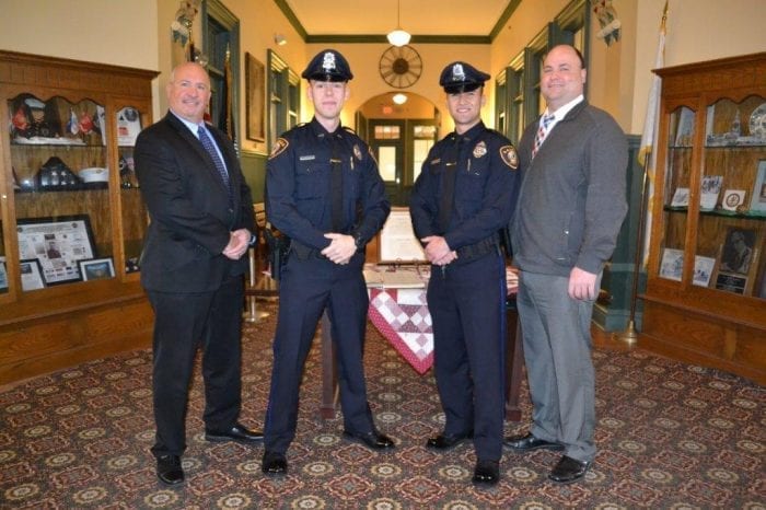Town Manager Scott C. Crabtree (right) announced the appointment of Officers Zelinski (second left) and Defreitas (second right) as Saugus Police Officers. They are joined by Saugus Police Chief Domenic DiMella (left).