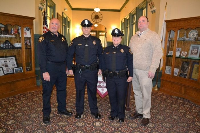 Town Manager Scott C. Crabtree (right) announced the appointment of Officers Fabrizio (second left) and Naumann (second right) as Saugus Police Officers. They are joined by Saugus Police Chief Domenic DiMella (left).