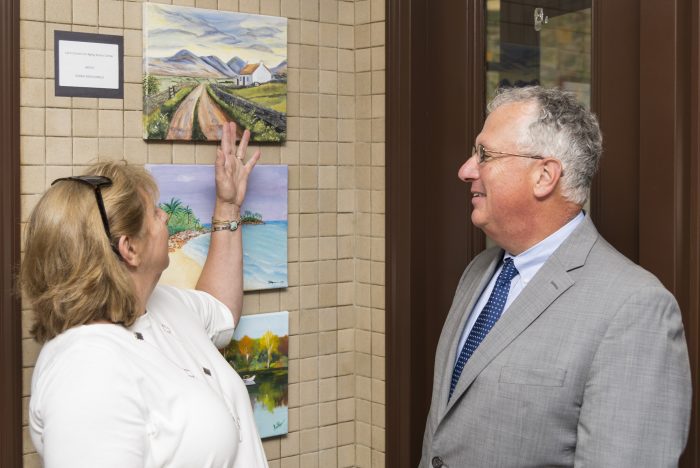 Mayor McGee brightens up Lynn City Hall with with artwork from the city