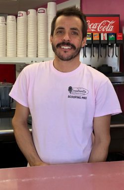 Mike Gould, behind the counter at Treadwells Ice Cream in Peabody.
