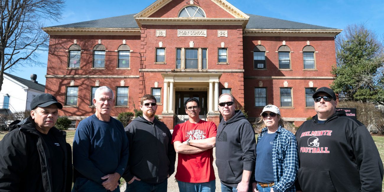 Saugus school custodians including, from left, Carlos Gonzalez, John McBride, Tom Lowe, Steve Raso, Rick Nelson, Angela McGeorge and Michael Mabee might lose their jobs if the town decides to privatize custodial services.