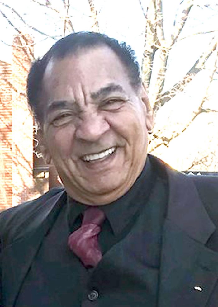 John L. Close, 71